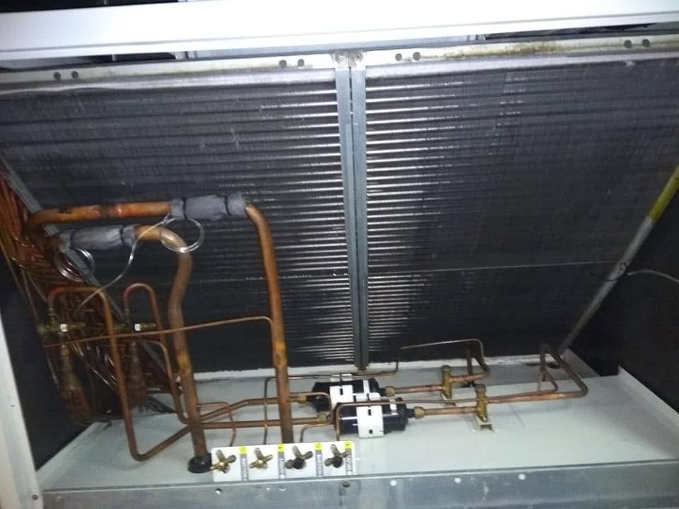 Package unit coil and piping after servicing