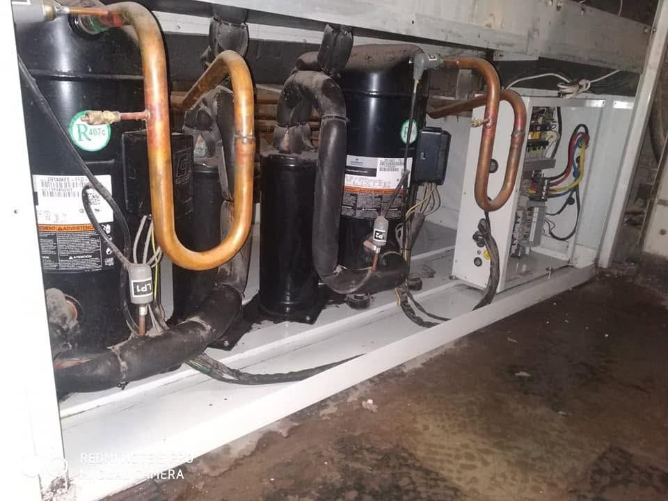 Compressors and panel after servicing
